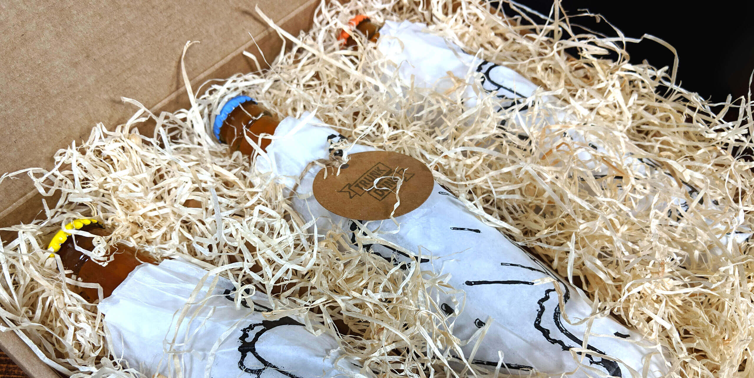 Trunk Dunk bottles packaged in boxes with straw
